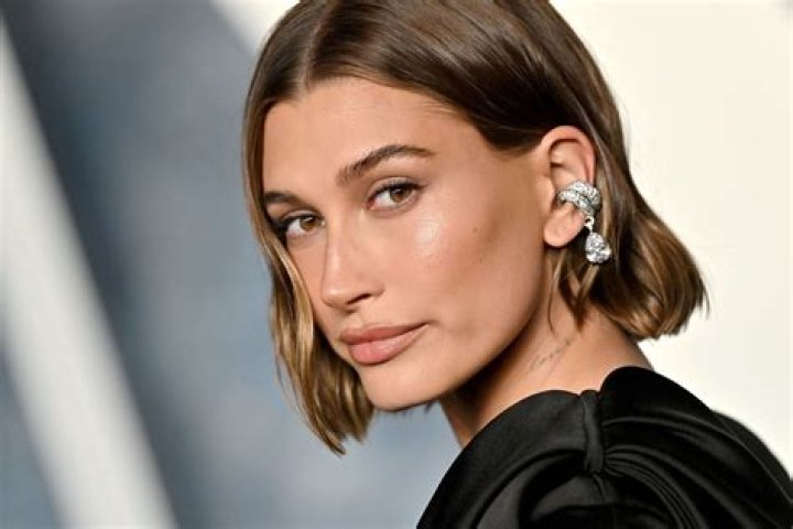 Hailey Bieber's new tattoo convinces fans it's a 'sign' - but blink and you'll miss it