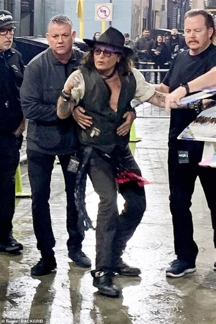 Johnny Depp spotted using walking aid after 'painful' injury amid 'legendary' tour