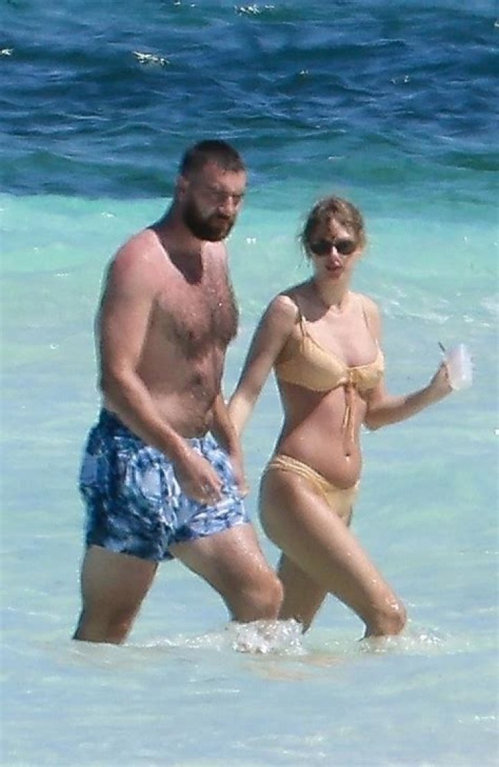 Travis Kelce and Taylor Swift share steamy kiss on the beach in the Bahamas